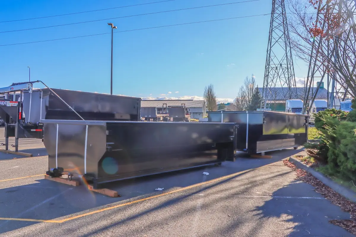 Roll-off dumpster ready for waste disposal at job site for 15 Yard Dumpster Rental in Aurora